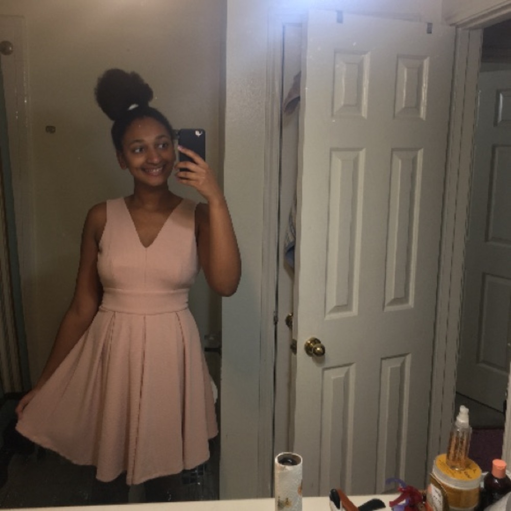 A pink dress mid length dress